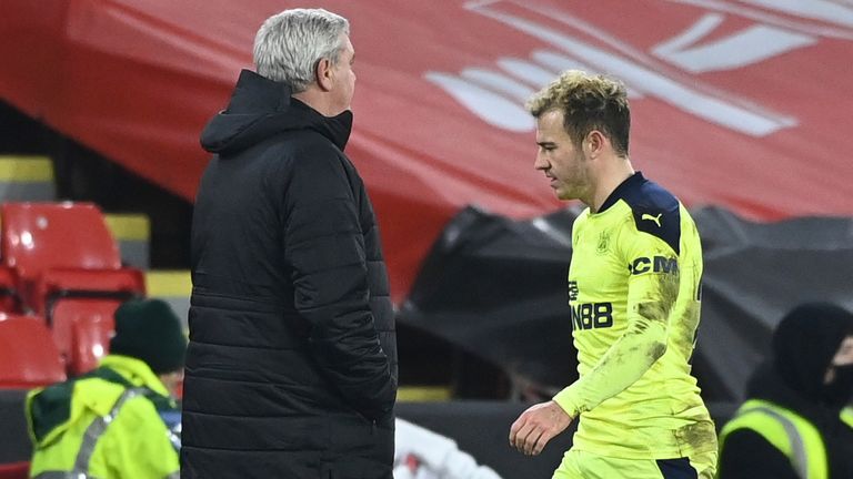 Ryan Fraser walks past Steve Bruce after being sent off against Sheffield United (AP)