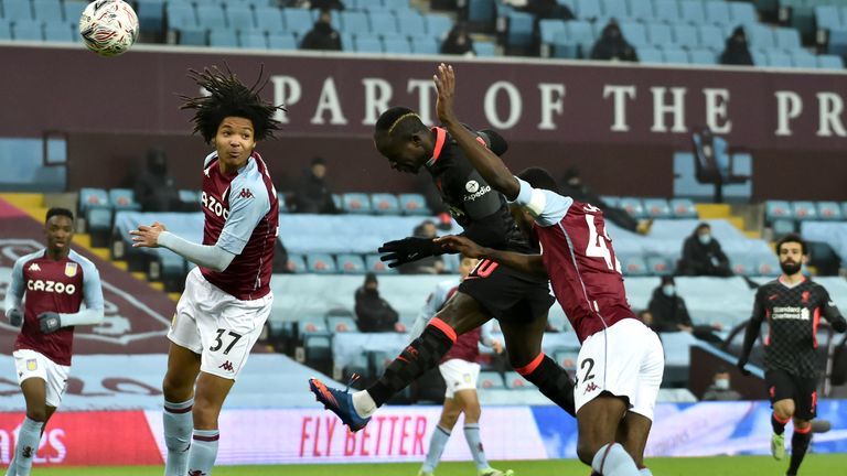 Sadio Mane heads Liverpool in front against Aston Villa in the FA Cup third round
