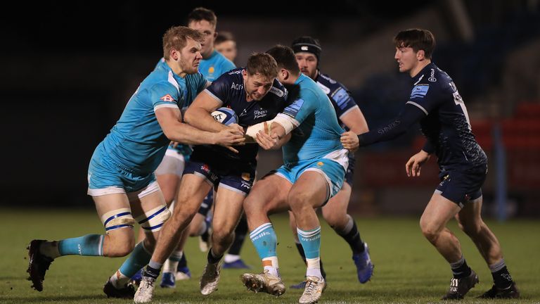 Sale's Sam Hill is wrapped up by the Worcester defence