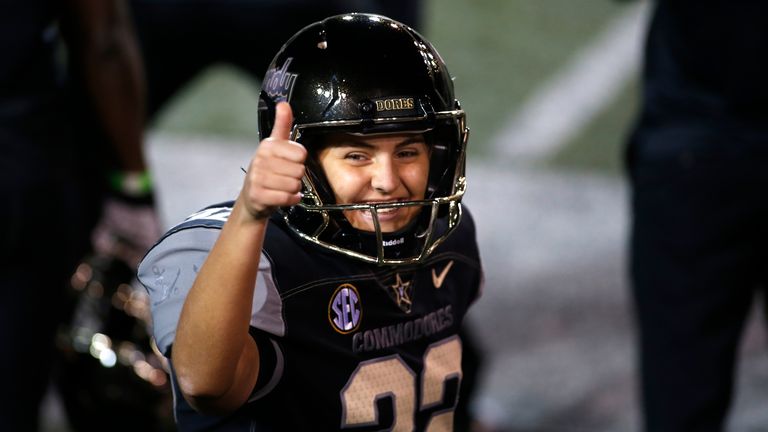 Vanderbilt Commodores place kicker Sarah Fuller (32) gives a thumbs up after successfully kicking her second point after attempt during a game between the Vanderbilt Commodores and Tennessee Volunteers in which she became the first female to score a point for a power five conference school, December 12, 2020 at Vanderbilt Stadium in Nashville, Tennessee.