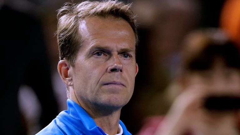 Stefan Edberg, former Grand Slam champion and coach of Switzerland's Roger Federer, watches Federer's quarterfinal against Andy Murray of Britain at the Australian Open tennis championship in Melbourne, Australia, Wednesday, Jan. 22, 2014.(AP Photo/Rick Rycroft