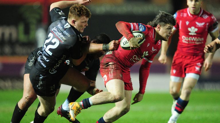 Steff Evans of Scarlets in action against the Dragons