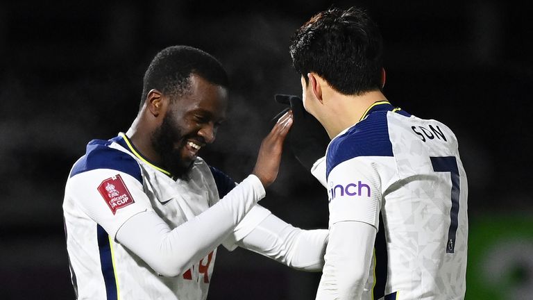 Tanguy Ndombele celebrates his first goal - Spurs' third - with team-mate Heung-Min Son