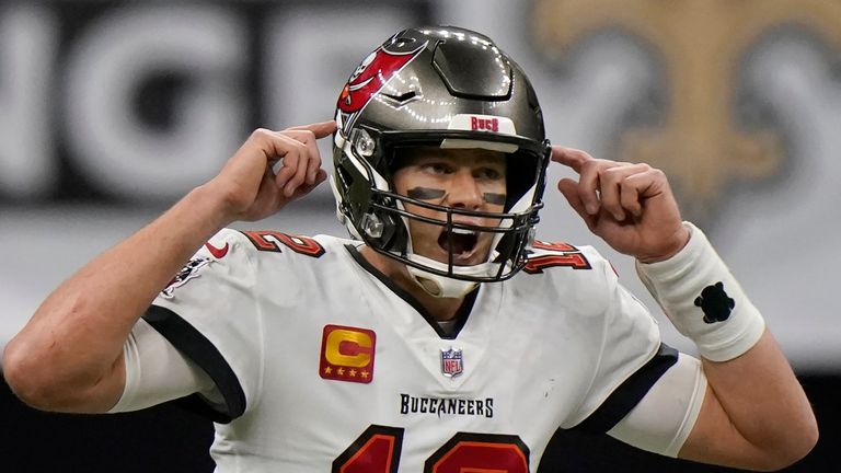 Tampa Bay Buccaneers quarterback Tom Brady (12) gestures against the New Orleans Saints during the second half of an NFL divisional round playoff football game, Sunday, Jan. 17, 2021, in New Orleans. (AP Photo/Brynn Anderson)        