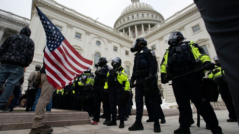 U.S. Capitol Police officers push back demonstrators who were trying to break into the U.S. Capitol