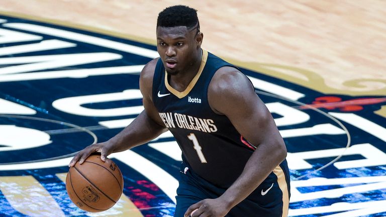 Zion Williamson drives with the ball for the New Orleans Pelicans against the Washington Wizards (AP Photo/Derick Hingle)