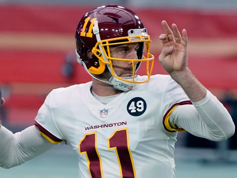 Washington Football Team quarterback Alex Smith (11) warms up before an NFL  football game against the New York Giants, Sunday, Oct. 18, 2020, in East  Rutherford, N.J. (AP Photo/Adam Hunger Stock Photo - Alamy