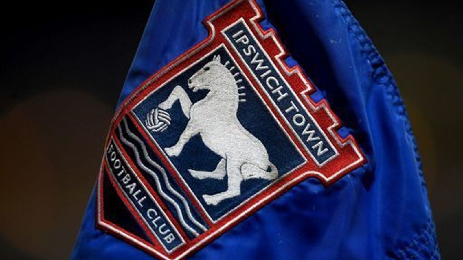 Ipswich Town: Group of supporters launch flares to halt training as signage catches fire | Football News