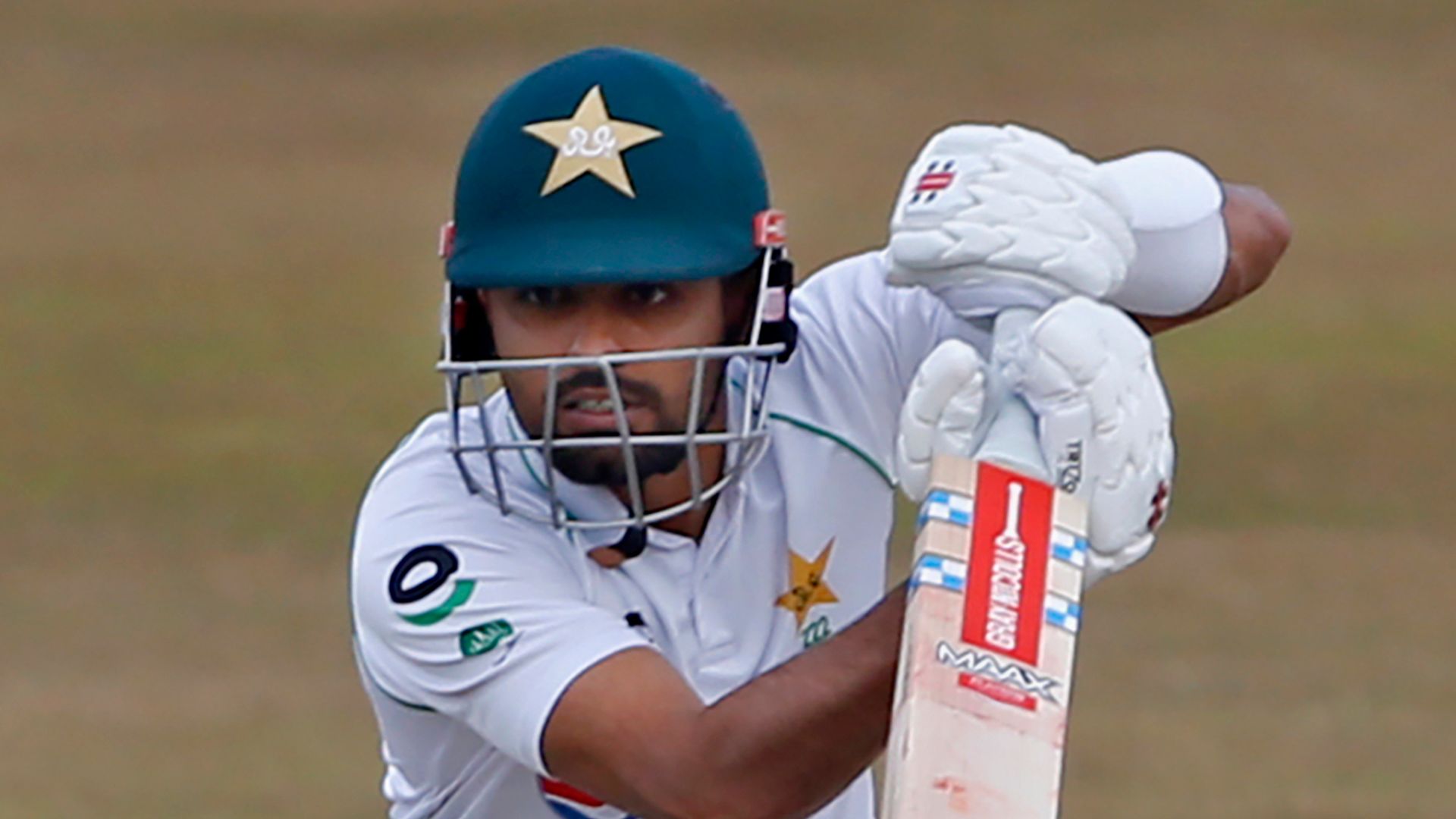Pakistan skipper Babar hits half-century on weather-hit day