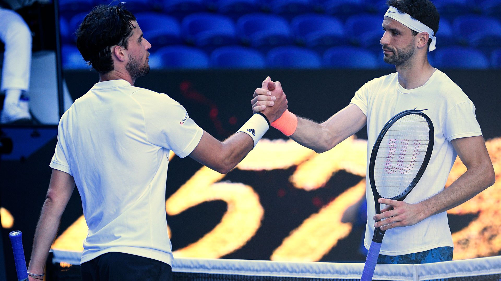 Dimitrov beats Thiem as qualifier Karatsev reaches quarters