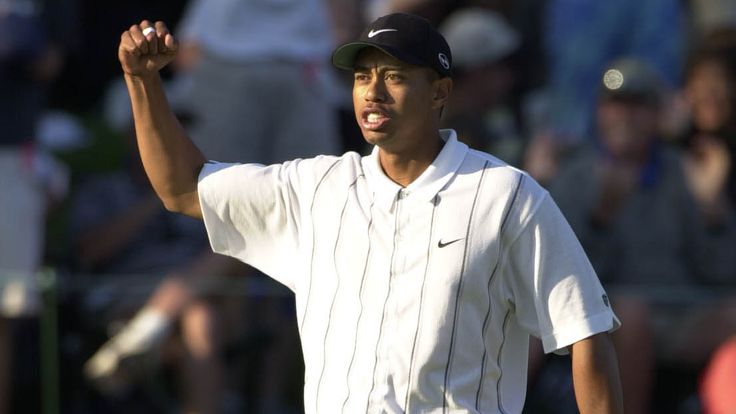 Tiger Woods celebrates after holing his famous putt on the 17th during the 2001 Players Championship at TPC Sawgrass
