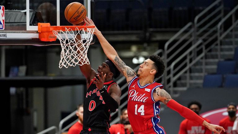 Philadelphia 76ers forward Danny Green blocks a shot by Toronto Raptors guard Terence Davis