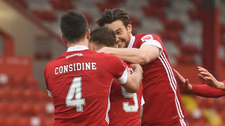 Aberdeen&#39;s Callum Hendry celebrates scoring to make it 1-0  with Andy Considine, Ash Taylor and Connor McLennan during a Scottish Premiership match between Aberdeen and Kilmarnock at Pittodrie on February 20, 2021, in Aberdeen, Scotland (Photo by Craig Foy / SNS Group)