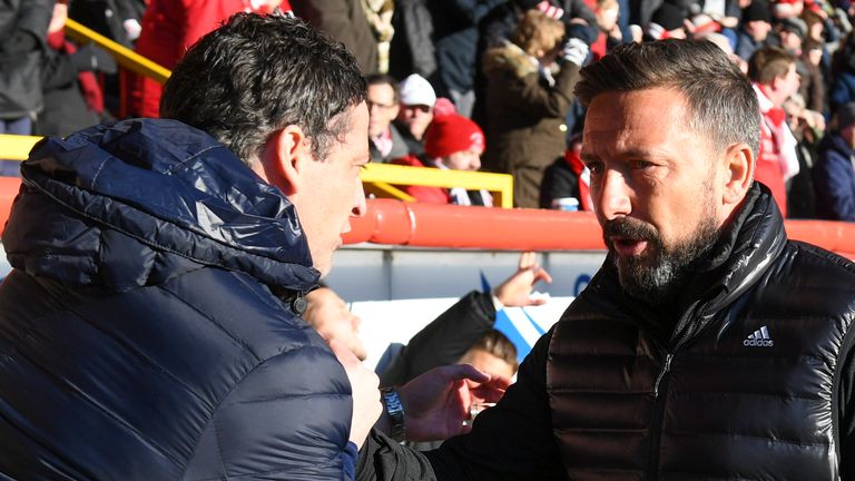 20/01/18 WILLIAM HILL SCOTTISH CUP 4TH RND.ABERDEEN v ST MIRREN.PITTODRIE - ABERDEEN.St Mirren manager Jack Ross (left) with Aberdeen manager Derek McInnes