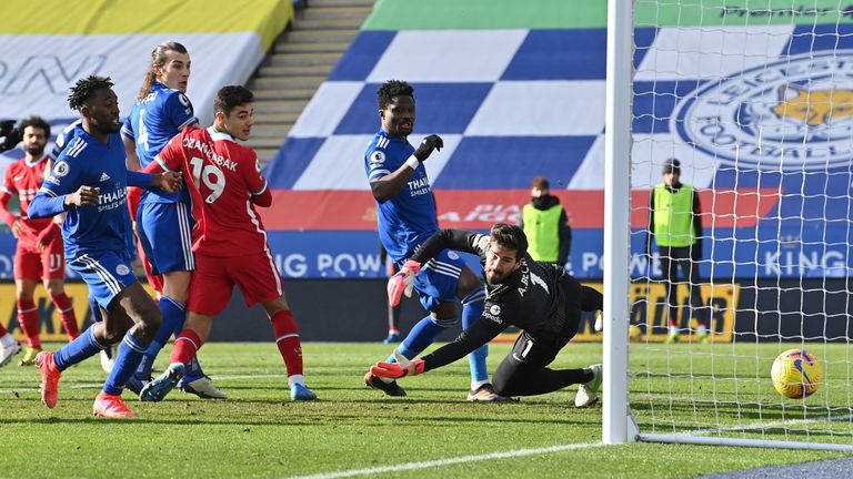 Alisson fails to save James Maddison's free kick (AP)