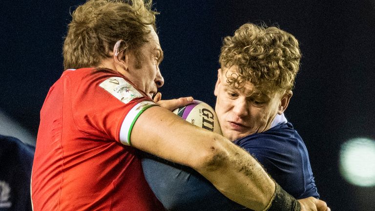 EDINBURGH, SCOTLAND - FEBRUARY 13: Wales' Alun Wyn Jones (left) tackles Scotland's Darcy Graham during a Guinness Six Nations tie between Scotland and Wales at BT Murrayfield, on February 13, 2021, in Edinburgh, Scotland. (Photo by Ross Parker / SNS Group)