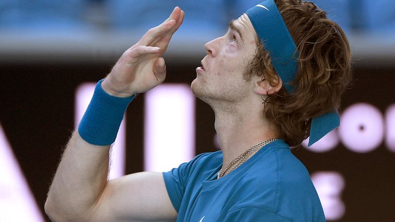 Andrey Rublev celebrates after defeating Spain's Feliciano Lopez in their third round match at the Australian Open tennis championship in Melbourne, Australia, Saturday, Feb. 13, 2021.(AP Photo/Andy Brownbill)