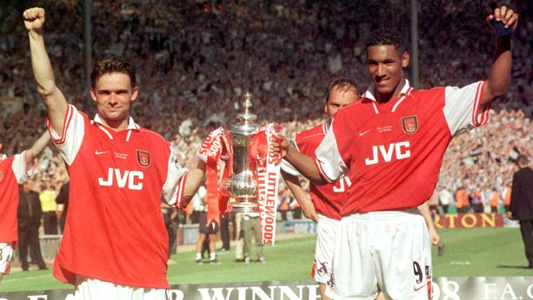 Nicolas Anelka holds the FA Cup with Marc Overmars in May 1998