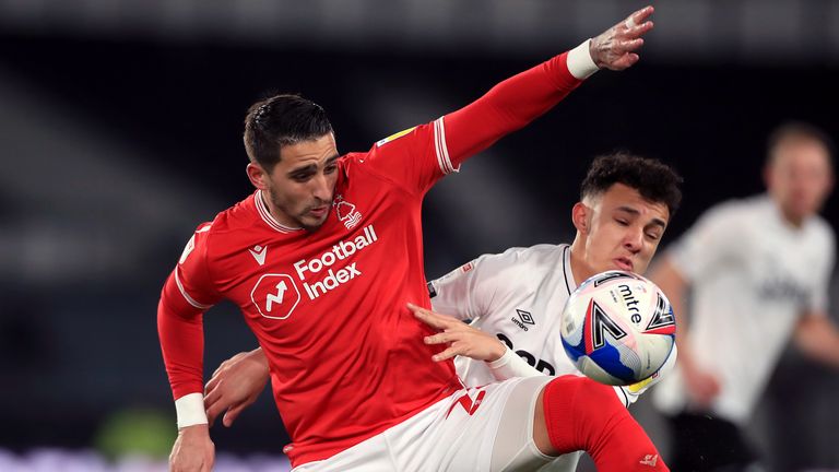 Nottingham Forest's Anthony Knockaert (left) and Derby County's Lee Buchanan battle for the ball 