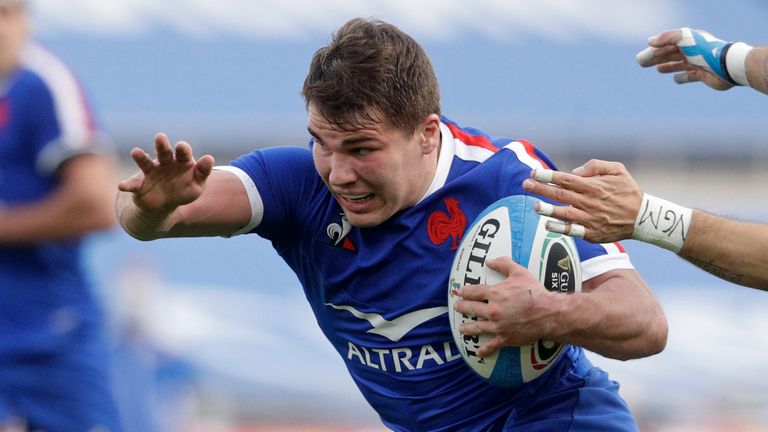 Antoine Dupont of France, left, is challenged by Italy...s Luca Sperandio as he sets-up his side...s third try during the Six Nations rugby union international between Italy and France at Rome...s Olympic stadium, Saturday, Feb. 6, 2021. (AP Photo/Gregorio Borgia)..