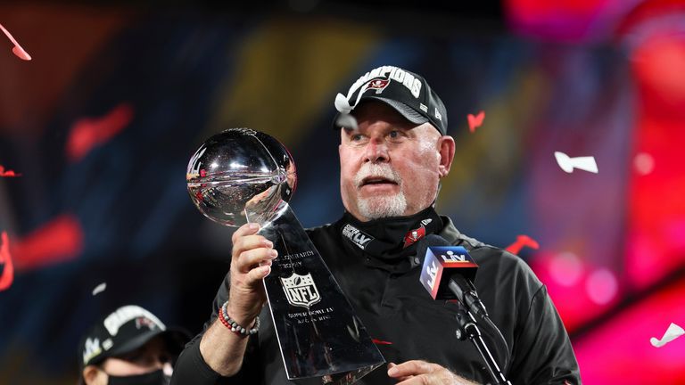 Tampa Bay Buccaneers head coach Bruce Arians holds the Vince Lombardi trophy following the NFL Super Bowl 55 football game against the Kansas City Chiefs, Sunday, Feb. 7, 2021 in Tampa, Fla. Tampa Bay won 31-9. (Ben Liebenberg via AP)


