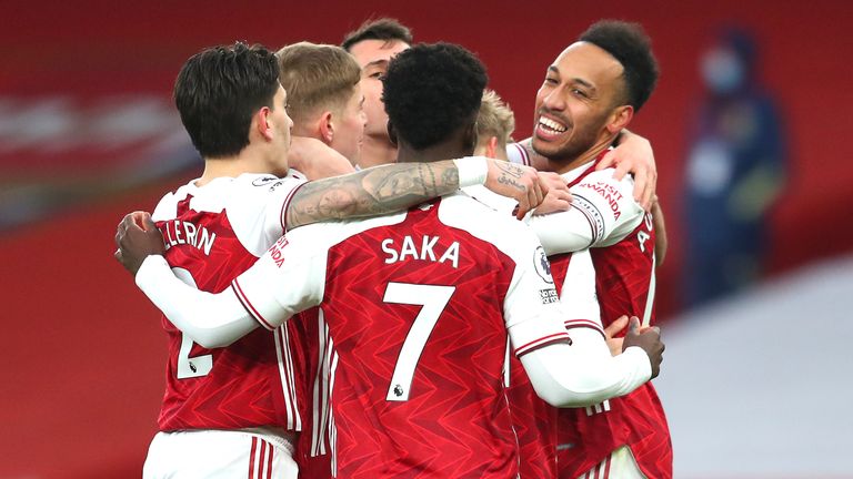 Arsenal players celebrate with Pierre-Emerick Aubameyang