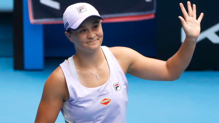 Australia&#39;s Ashleigh Barty waves after defeating compatriot Daria Gavrilova in their second round match at the Australian Open tennis championship in Melbourne, Australia, Thursday, Feb. 11, 2021.(AP Photo/Rick Rycroft)