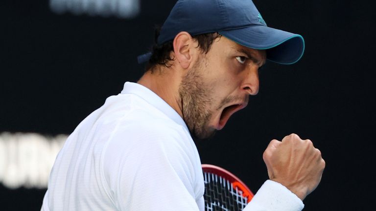 Russia's Aslan Karatsev reacts during his third round match against Argentina's Diego Schwartzman at the Australian Open tennis championship in Melbourne, Australia, Friday, Feb. 12, 2021.(AP Photo/Hamish Blair)