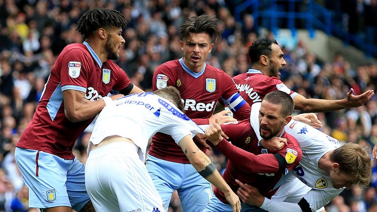 Leeds United's Mateusz Klich is confronted by Aston Villa's Conor Hourihane after he scores his sides first goal whilst Aston Villa's Jonathan Kodjia was down injured during the Sky Bet Championship match at Elland Road, Leeds.
