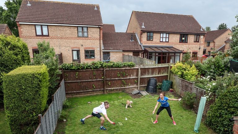 British badminton players Lauren Smith and Marcus Ellis improvise to keep up their fitness in the back garden of their Milton Keynes home (Pic PA). 