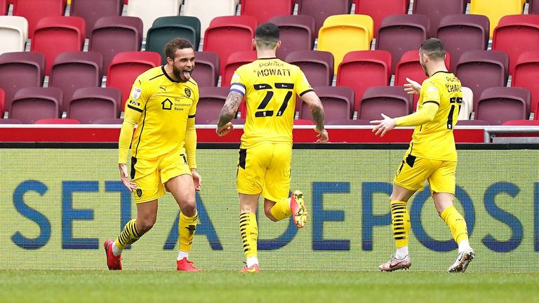 Barnsley's Carlton Morris (left) celebrates scoring their side's second goal of the game with…