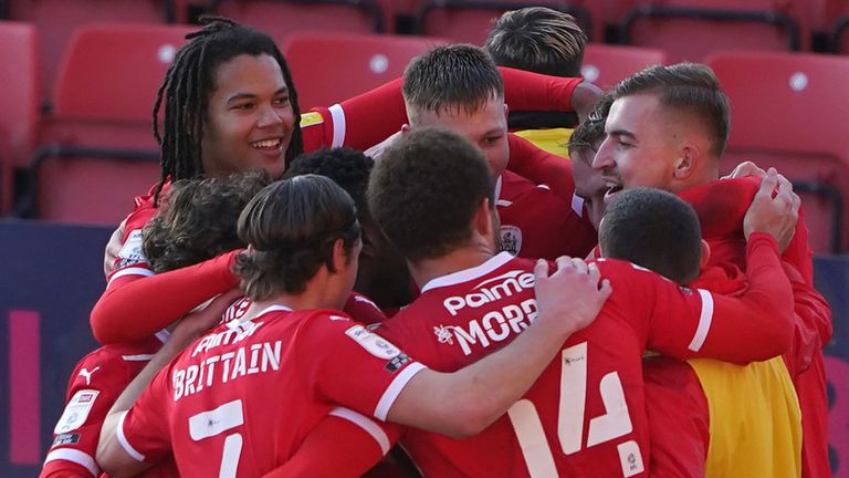 Barnsley breathed further life into their play-off push with a 2-1 win over Millwall at Oakwell