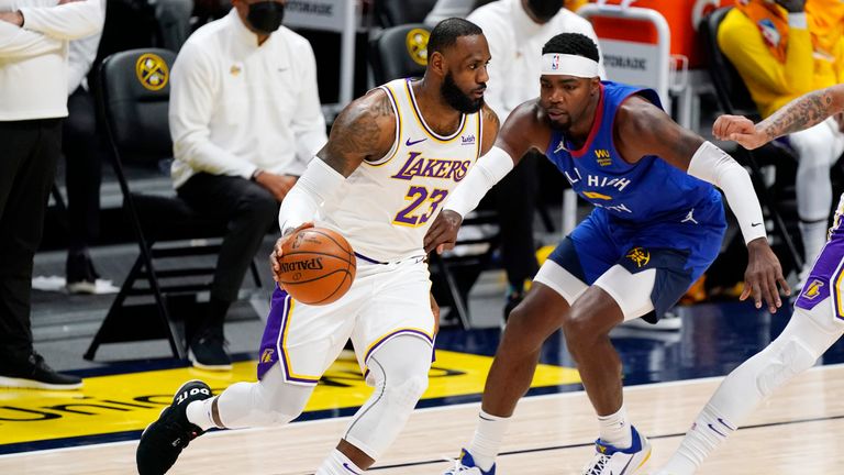 Los Angeles Lakers star LeBron James ran the length of the court before finishing with the one-handed dunk against the Denver Nuggets.