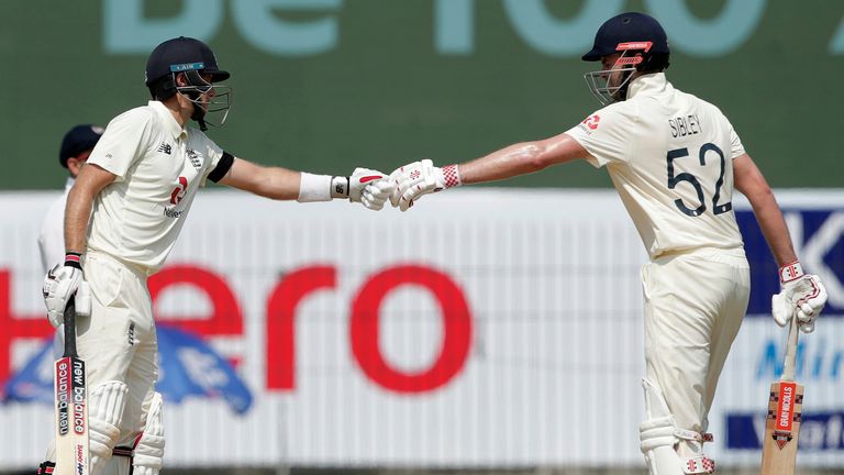BCCI image - Dom Sibley of England  and Joe Root (captain) of England celebrating during day one of the first test match between India and England held at the Chidambaram Stadium stadium in Chennai, Tamil Nadu, India on the 5th February 2021..Photo by Saikat Das/ Sportzpics for BCCI