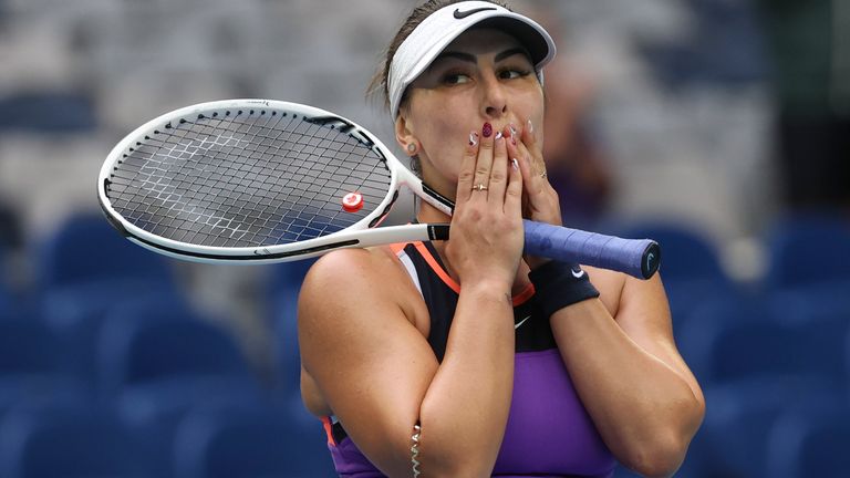 Canada's Bianca Andreescu reacts after defeating compatriot Romania's Mihaela Buzarnescu during their first round match at the Australian Open tennis championship in Melbourne, Australia, Monday, Feb. 8, 2021. (AP Photo/Hamish Blair)