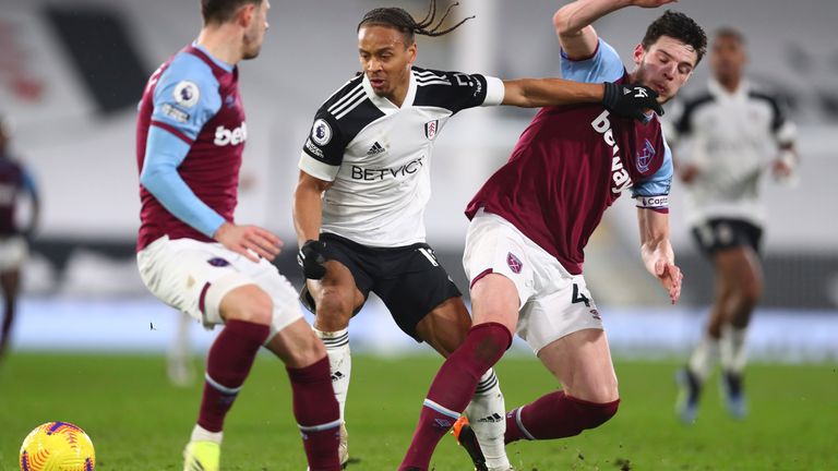 Bobby Decordova-Reid is challenged by Declan Rice (AP)