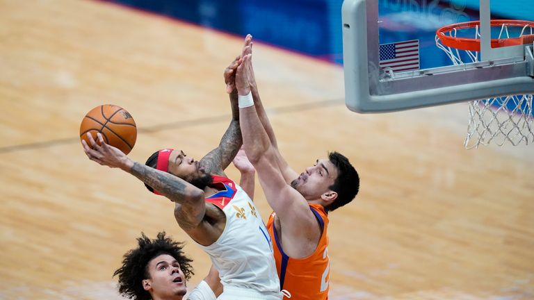 New Orleans Pelicans forward Brandon Ingram shoots against Phoenix Suns forward Dario Saric