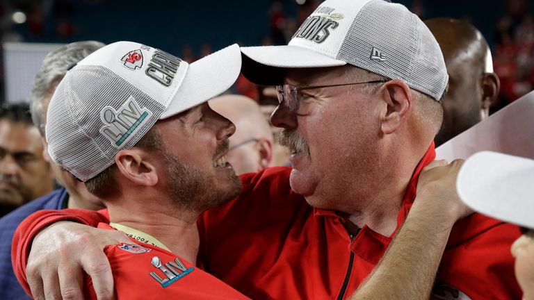 Kansas City Chiefs head coach Andy Reid embraces his son Britt (left) after Super Bowl LIV