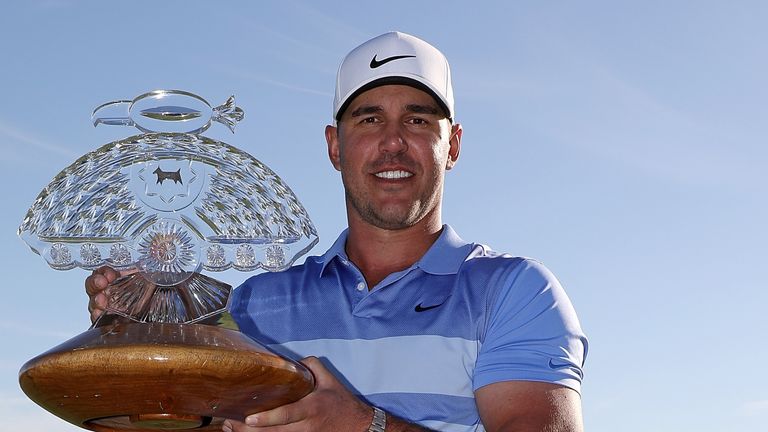 Brooks Koepka with the Phoenix Open trophy