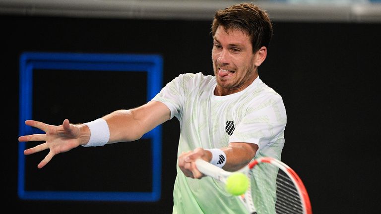 Britain's Cameron Norrie makes a forehand return during his second round match against Russia's Roman Safiullin (AP Photo/Andy Brownbill)
