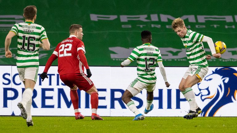 Florian Kameri claims for a Stephen Welsh handball during a Scottish Premiership match between Celtic and Aberdeen at Celtic Park