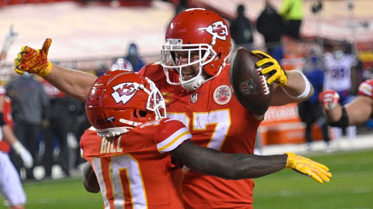 Kansas City Chiefs tight end Travis Kelce celebrates with teammate Tyreek Hill (10) after catching a 5-yard touchdown pass during the second half of the AFC championship NFL football game against the Buffalo Bills, Sunday, Jan. 24, 2021, in Kansas City, Mo. 