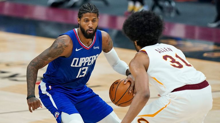 Los Angeles Clippers&#39; Paul George drives to the basket against Cleveland Cavaliers&#39; Jarrett Allen 
