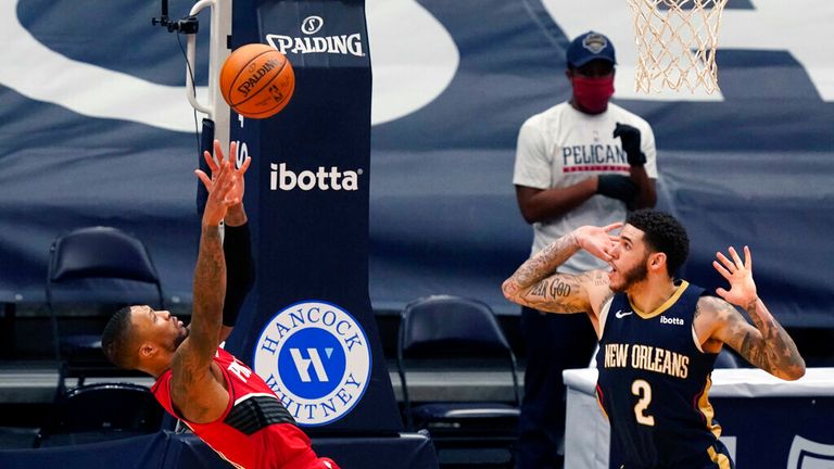 AP - Portland Trail Blazers guard Damian Lillard shoots the go-ahead basket against New Orleans Pelicans guard Lonzo Ball