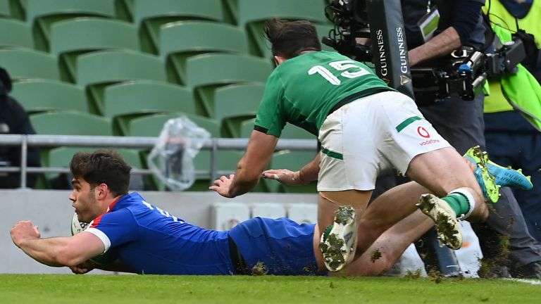 Dublin , Ireland - 14 February 2021; Damian Penaud of France scores his side's second try despite the tackle of Hugo Keenan of Ireland during the Guinness Six Nations Rugby Championship match between Ireland and France at the Aviva Stadium in Dublin. (Photo By Brendan Moran/Sportsfile via Getty Images)