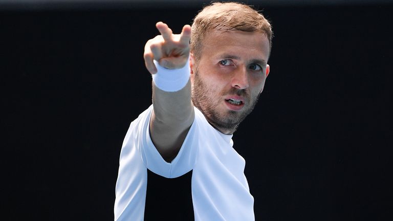 Britain's Dan Evans celebrates after defeating Canada's Felix Auger-Alliassime in the final of Murray River Open in Melbourne, Australia, Sunday, Feb. 7, 2021.(AP Photo/Andy Brownbill)