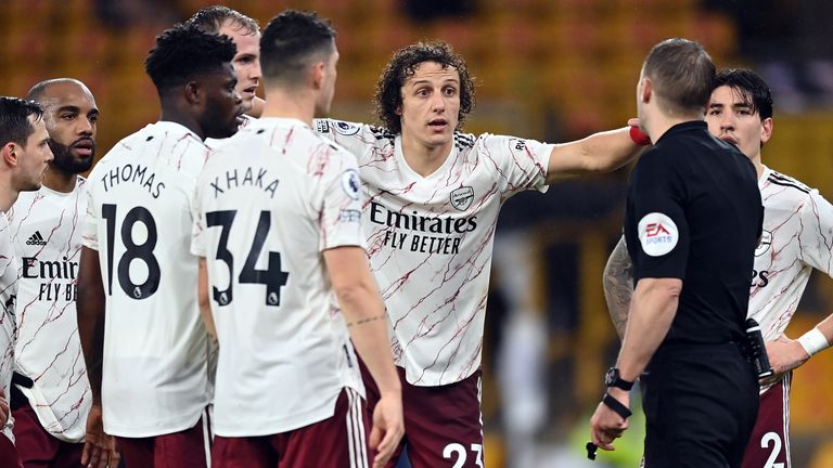 David Luiz protests to the referee after receiving a red card