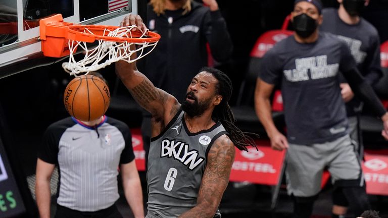 Brooklyn Nets' DeAndre Jordan dunks the ball in front of Indiana Pacers defense