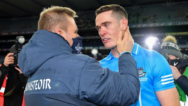 Dessie Farrell and Brian Fenton embrace after December's All-Ireland final