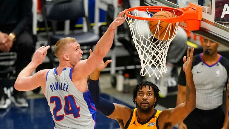 AP - Detroit Pistons center Mason Plumlee (24) dunks the ball as Utah Jazz center Derrick Favors 